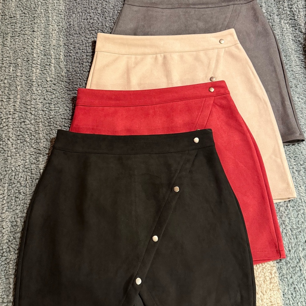 Selling all four colors together as a bundle. Never worn. Size Medium.